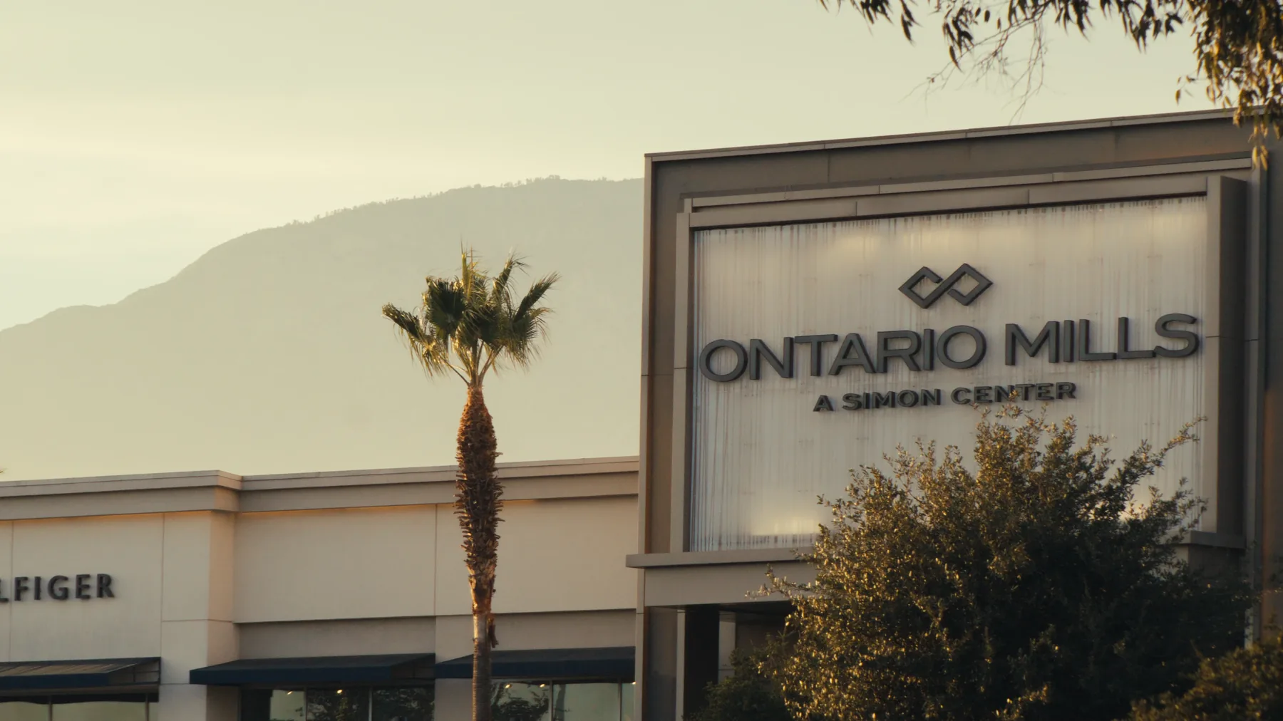 The Ontario Mills entrance with the San Gabriel Mountains behind it